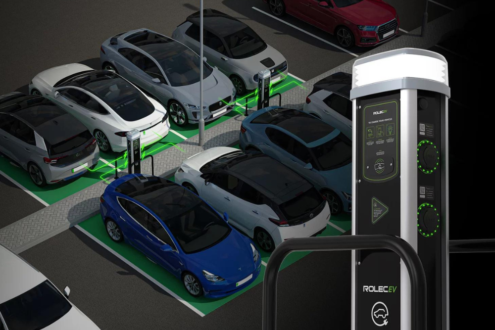 Cars parked in a car park charging using a Quantum charger